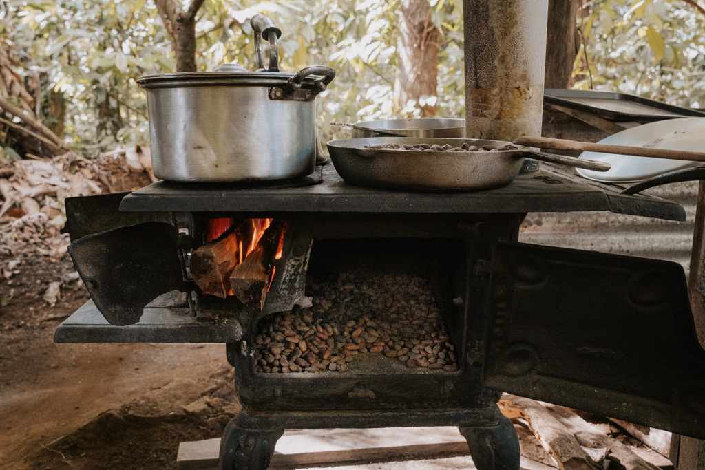 stove with roasting costa rica cocoa beans inside 