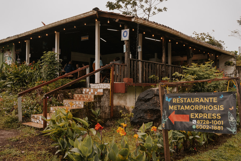 a one story open air restaurant with stairs near rio celeste costa rica waterfalls