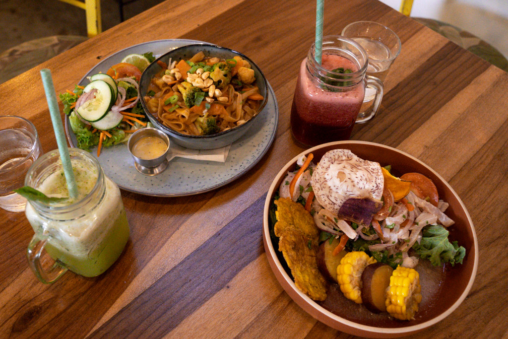 where to eat in la fortuna costa rica with asian inspired dishes and smoothies on wood tabletop