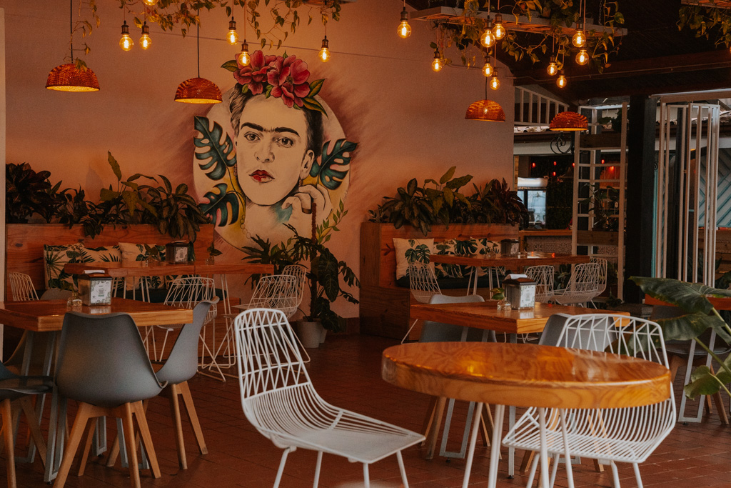 restaurants arenal costa rica with graphic interior with mural of frida kahlo