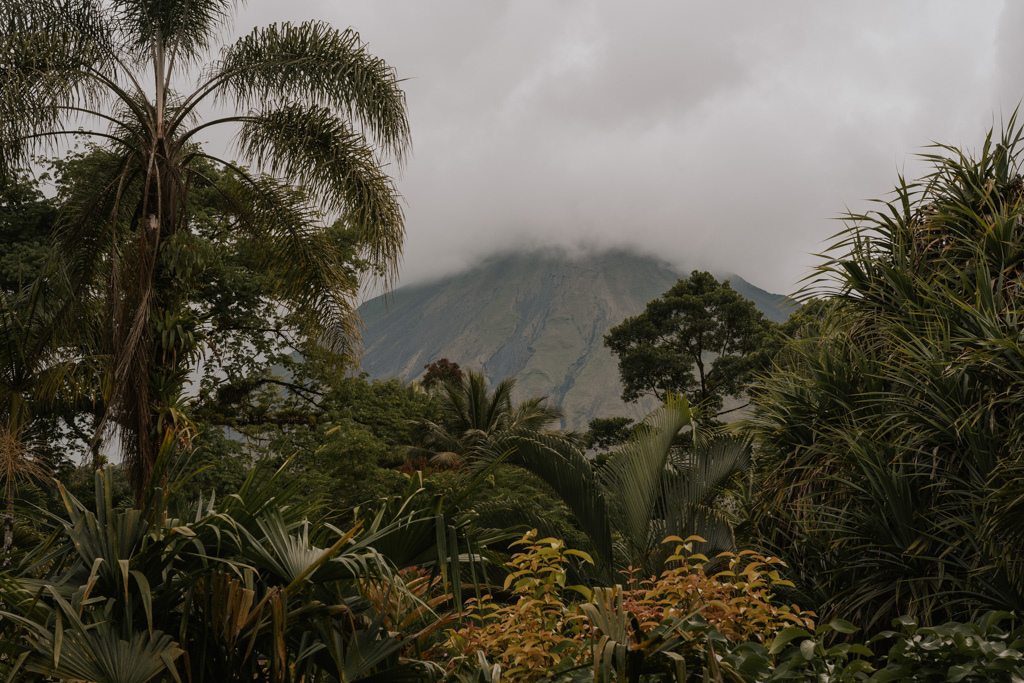 views of misty arenal volcano at tabacon costa rica